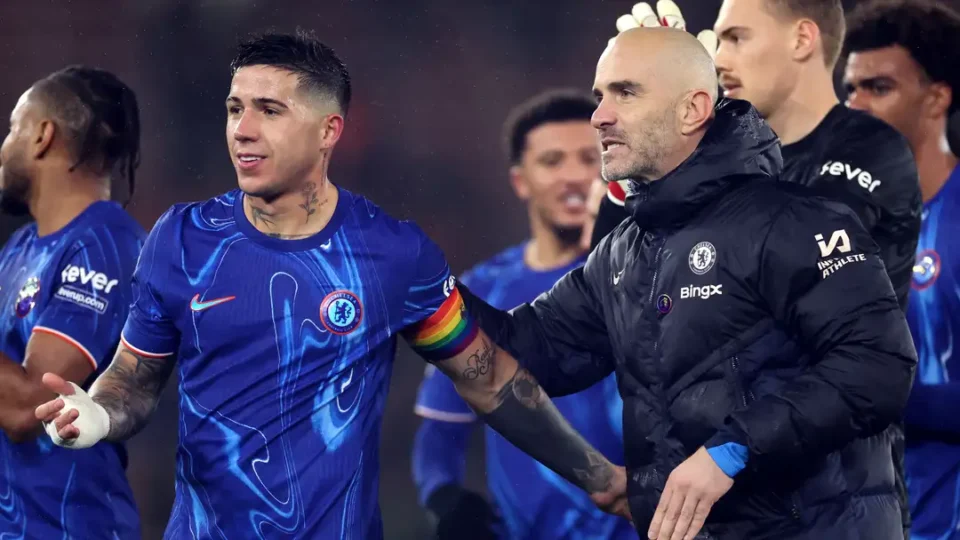 Chelsea players celebrating on the field.